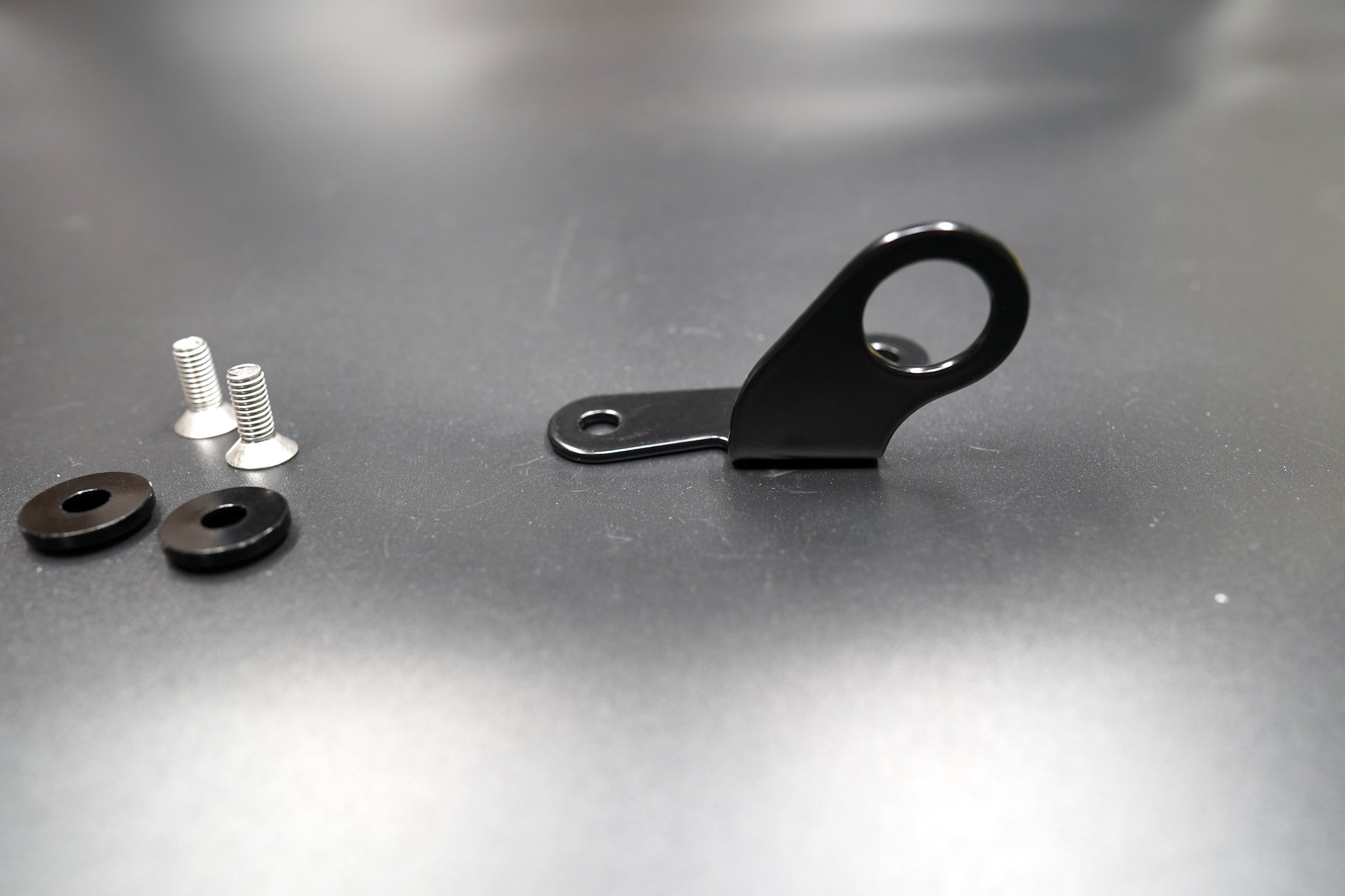  Outlet partially assembled with bracket and rubber cover