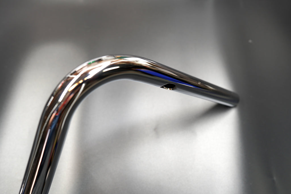 Side angle of handlebar showing clean bend and internal wiring hole