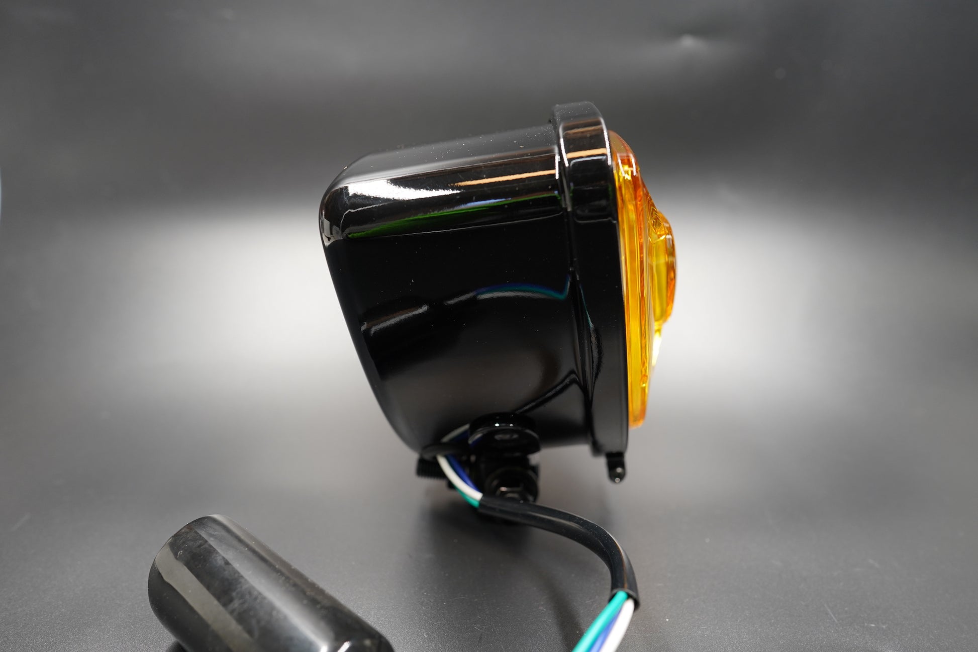 Retro Triangle Motorcycle Headlight – Clear / Amber Lens