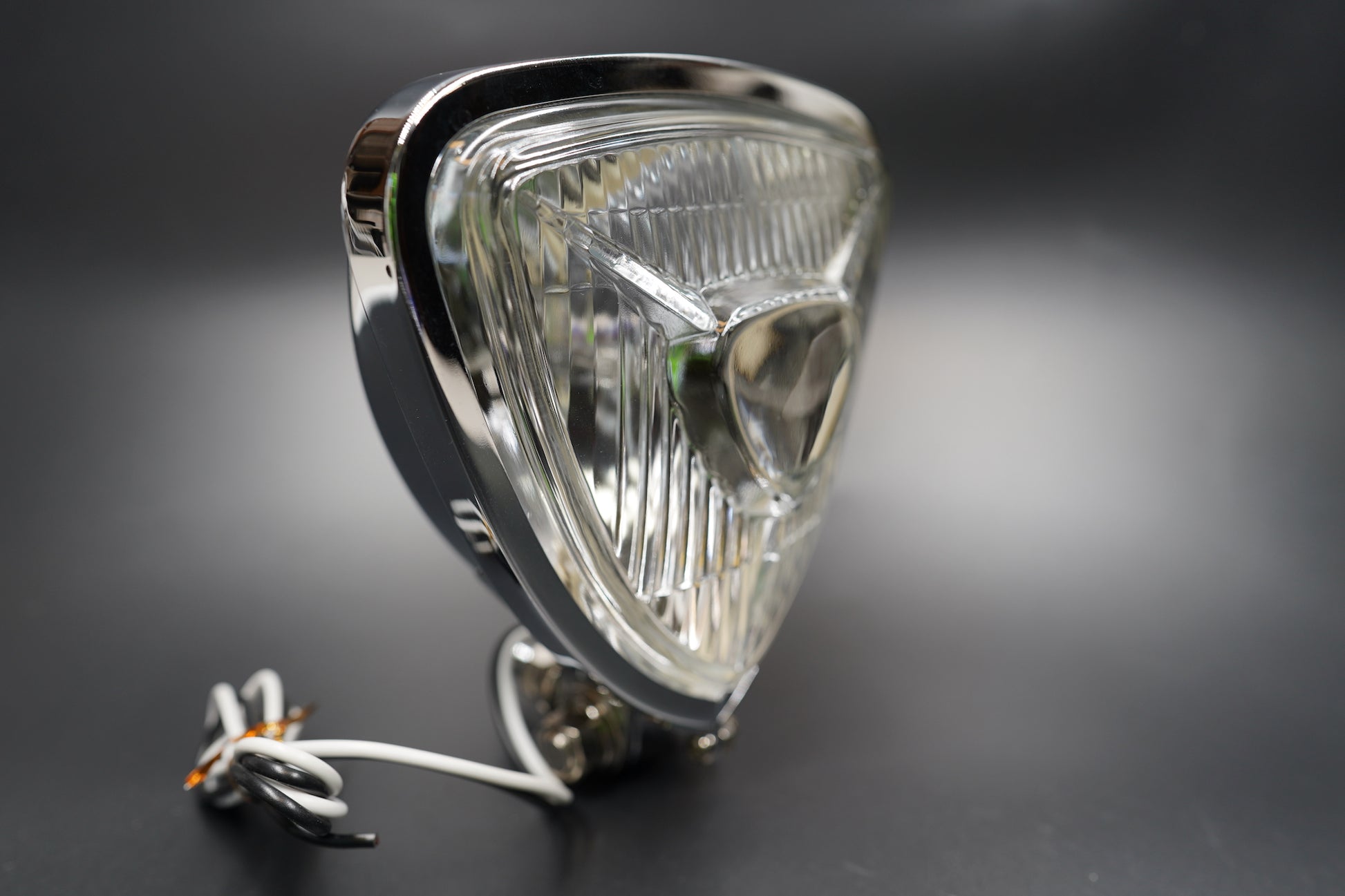 Retro Triangle Motorcycle Headlight – Clear / Amber Lens