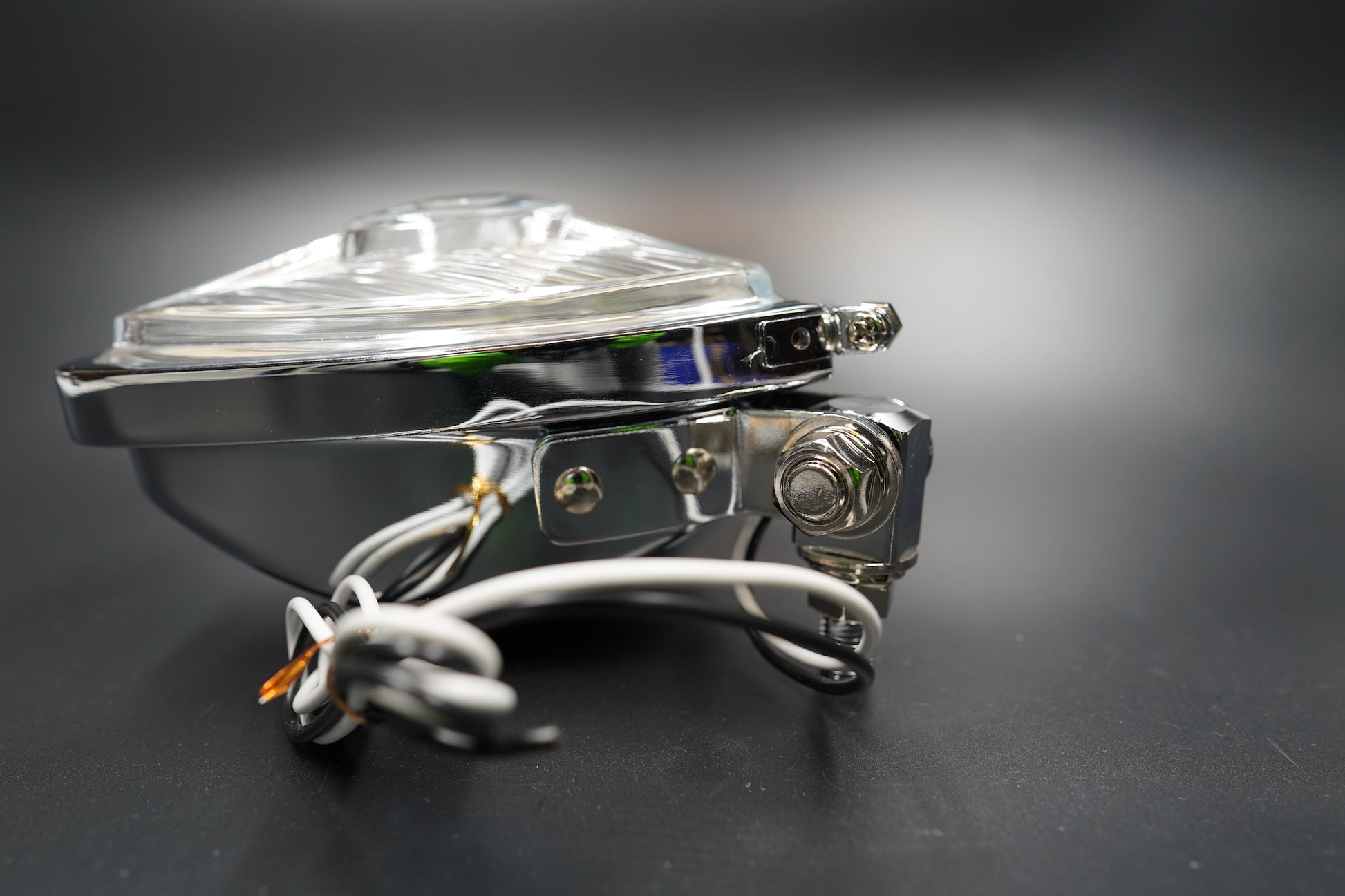 Retro Triangle Motorcycle Headlight – Clear / Amber Lens