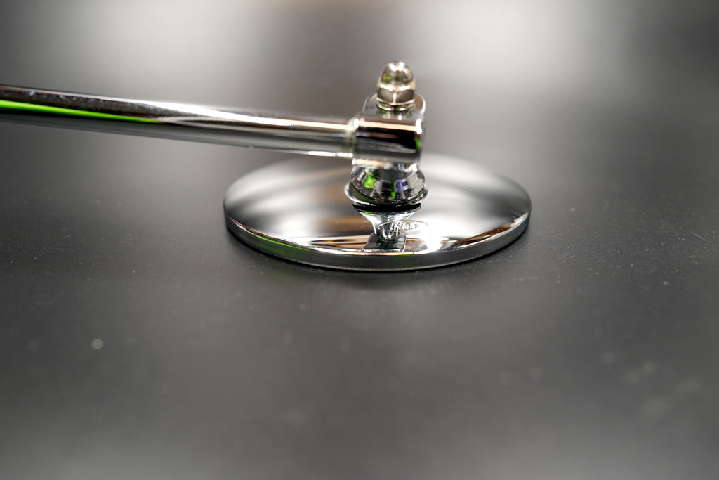 Detail of chrome mirror base and mount

