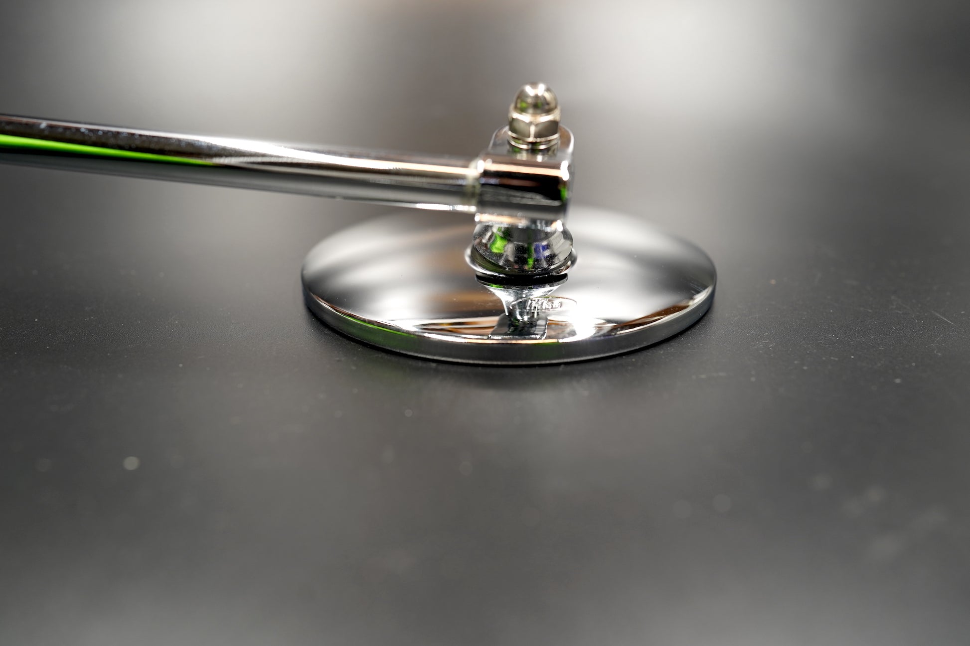 Detail of chrome mirror base and mount

