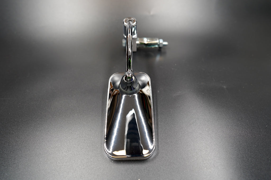 Chrome rectangular motorcycle mirror showing front detail