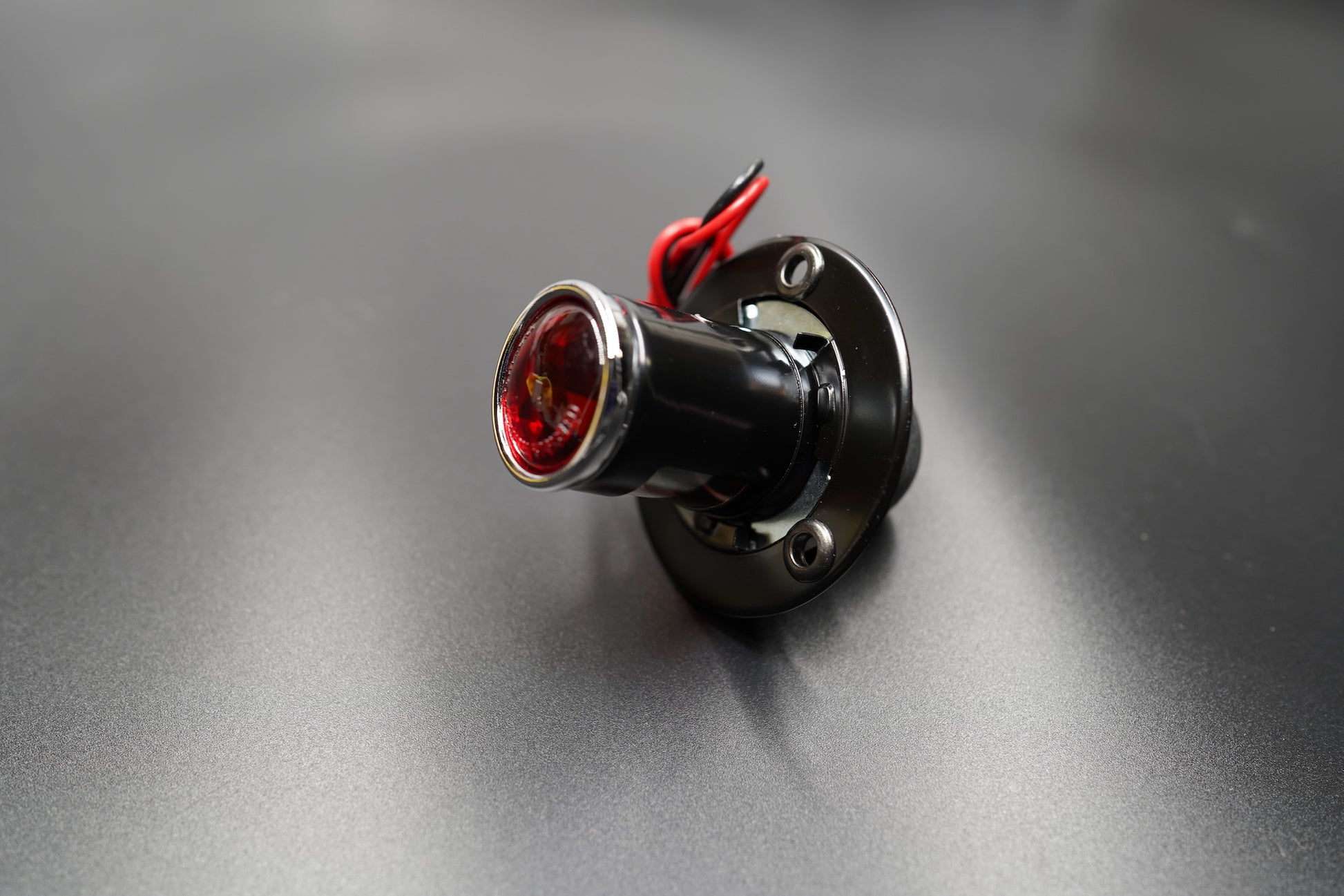 Bottom angle capturing mounting holes and cable exit point.