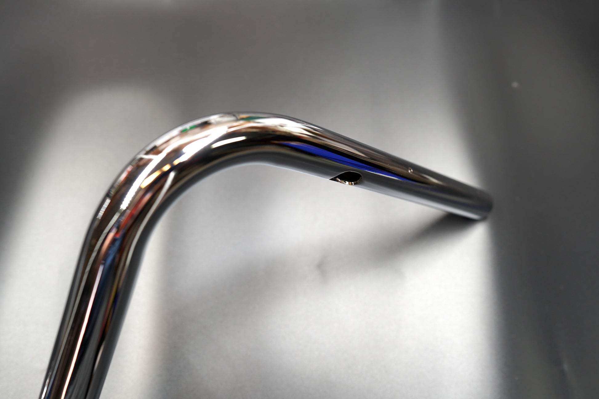 Close-up of curved section highlighting finish and weld precision