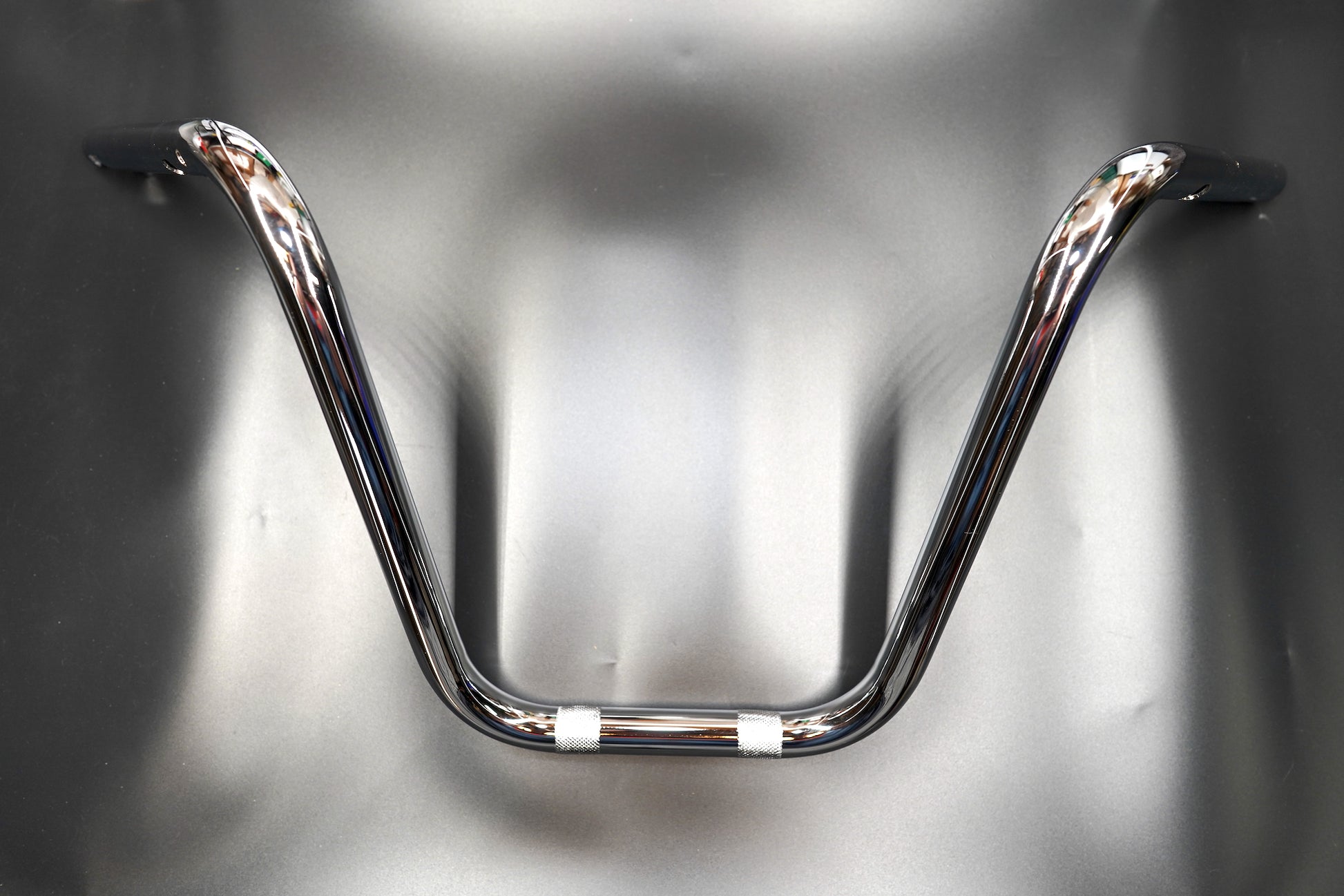 Straight front view showing symmetrical rise 