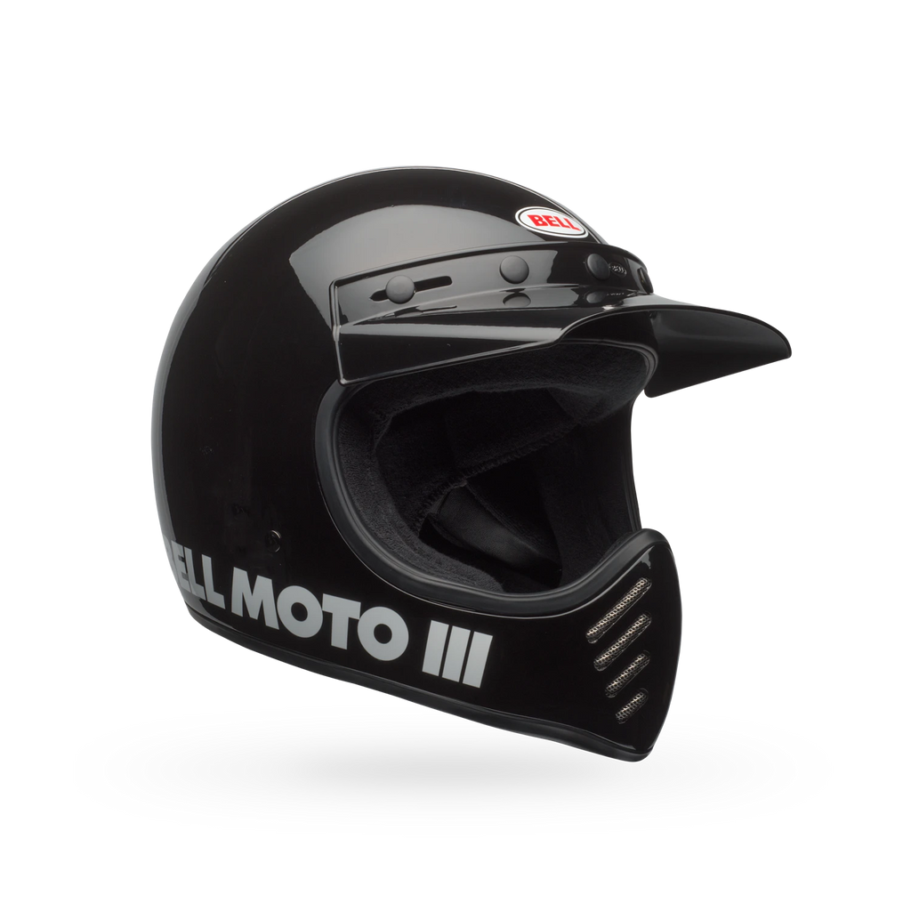 Left side view of Bell Moto-3 Helmet showing fiberglass composite shell and Bell Moto III logo.