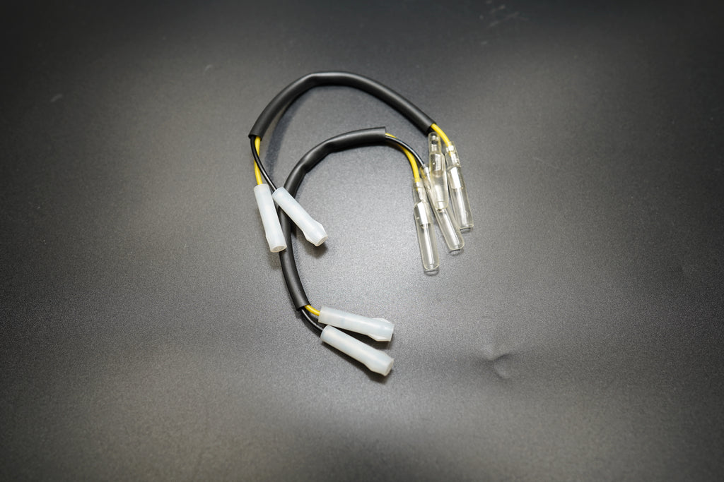 op view of BMW R NineT turn signal aluminum spacers showing mounting holes