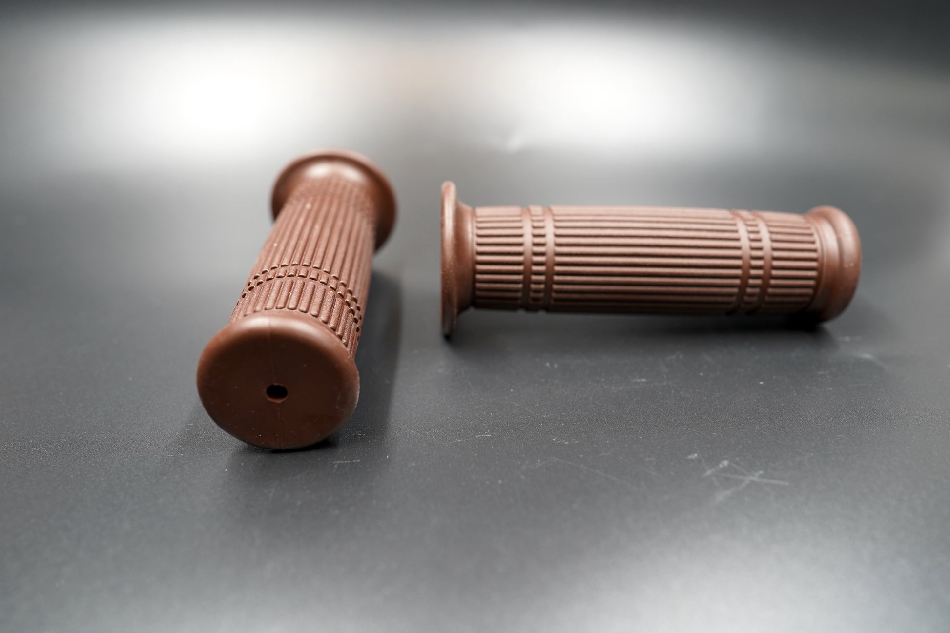 Top-down perspective displaying clean rib pattern and open-end structure for bar-end mirrors.