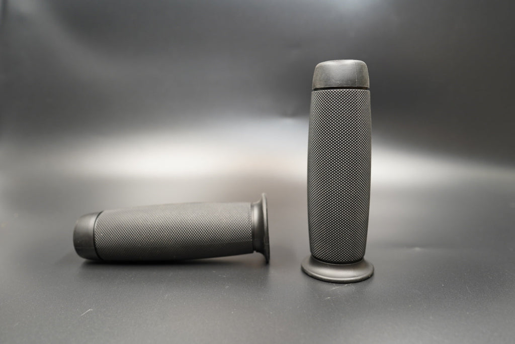 Front view of black rubber motorcycle grips for 22mm handlebars — simple, durable, and comfortable design.
