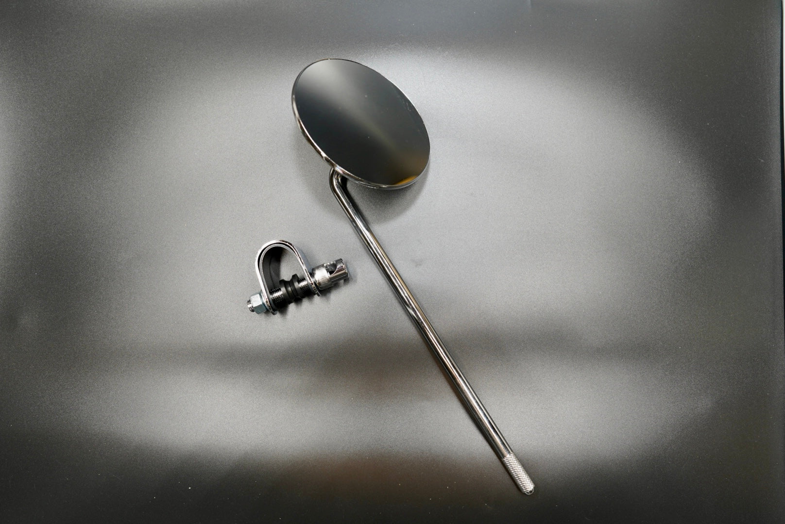 Top angled view highlighting polished silver finish and bar clamp design.