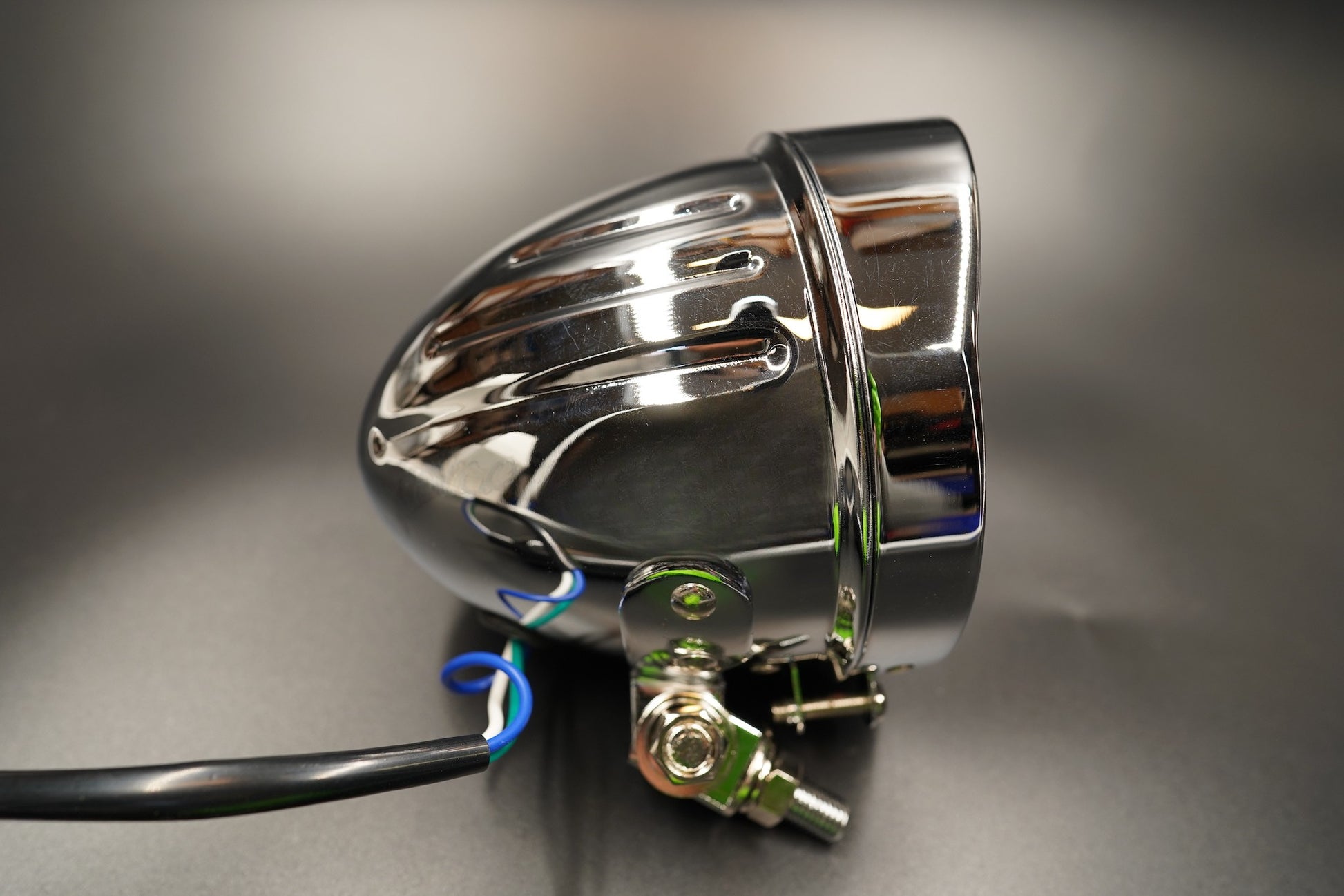 Diagonal front angle revealing chrome depth and reflection pattern.