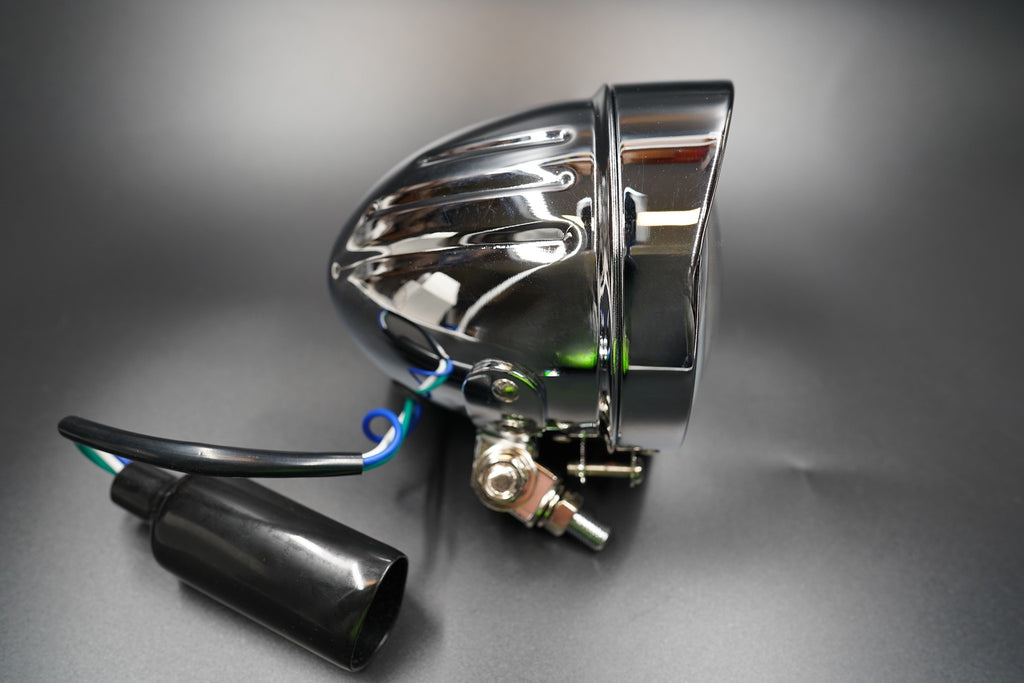 Bottom mount detail showing universal fit bracket and cable connection.