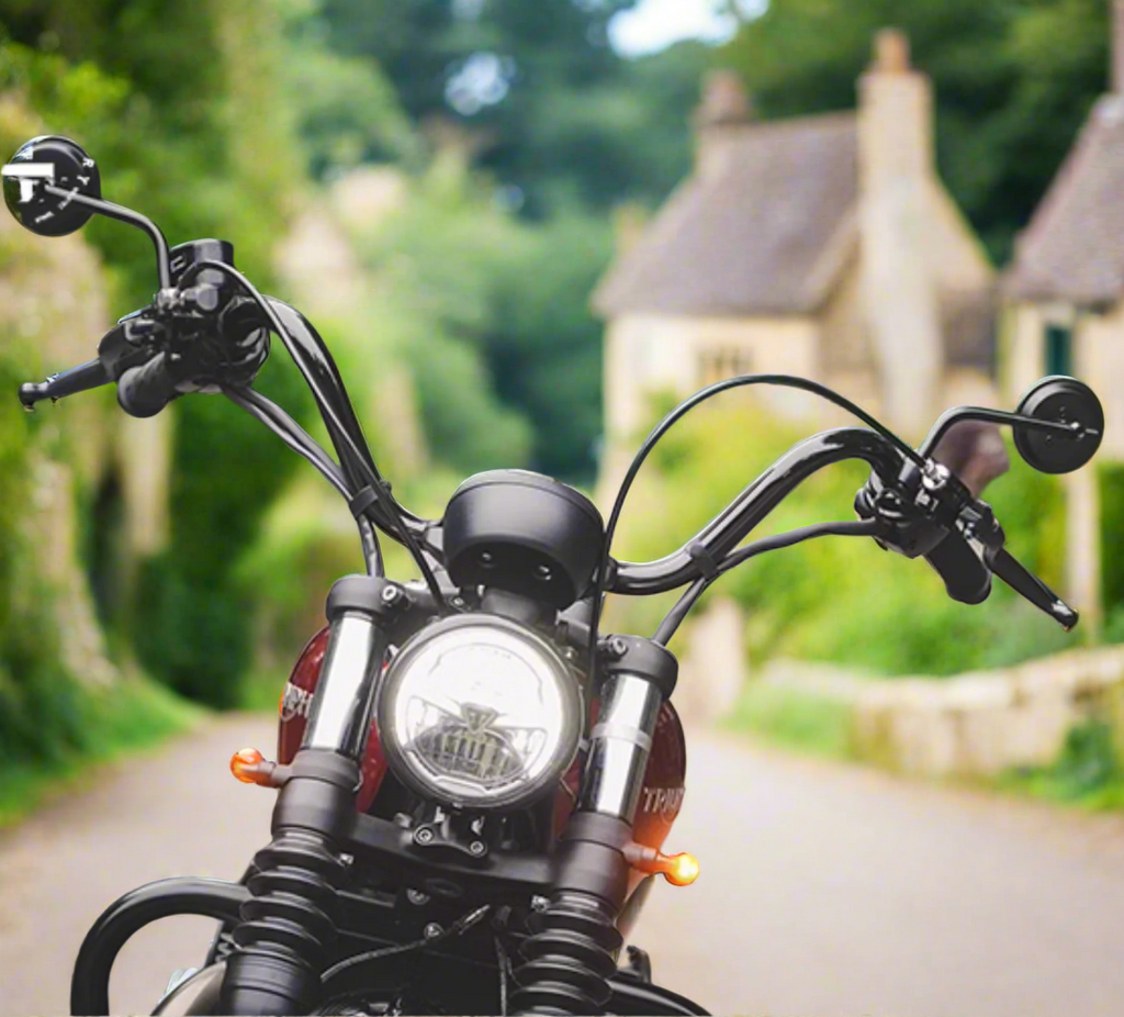 Triumph Bobber with gloss black Flow Handlebar in outdoor scene 