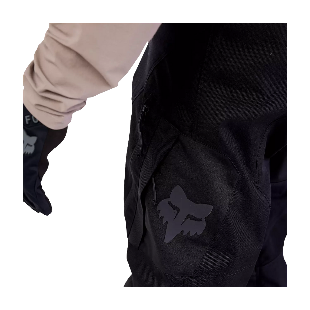 Side view of Fox Defend Offroad Pants showing full-grain leather inner knee for grip and heat protection.