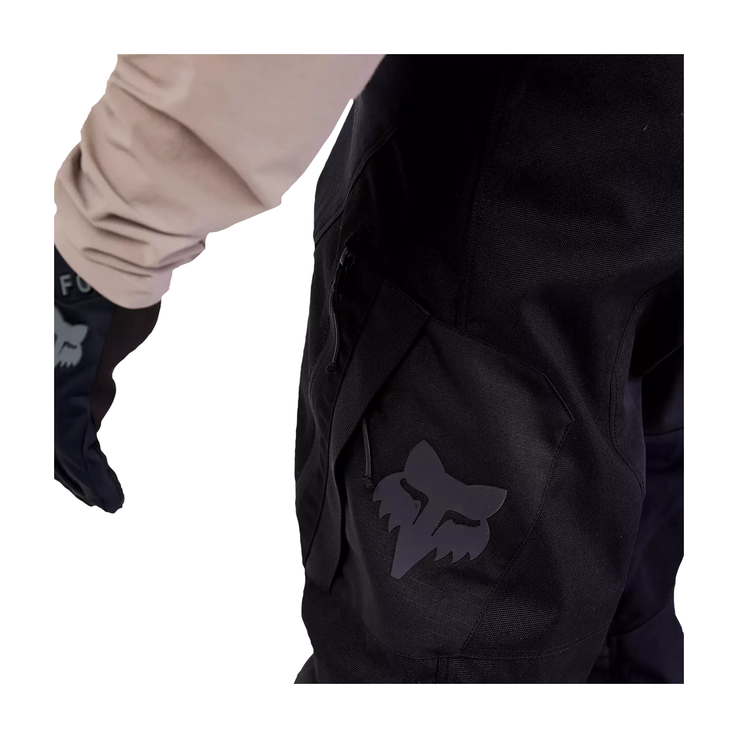 Side view of Fox Defend Offroad Pants showing full-grain leather inner knee for grip and heat protection.