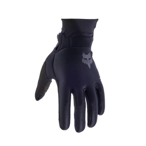 Angled view of Fox Defend Thermo Gloves in black — compression neoprene cuff and minimal bulk design for cold-weather riding.