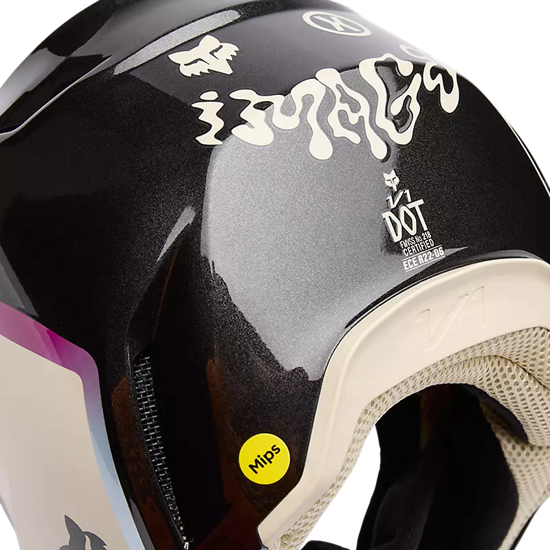 Close-up of FOX V1 Hello Future Helmet artwork and reflective graphic detailing on matte finish.