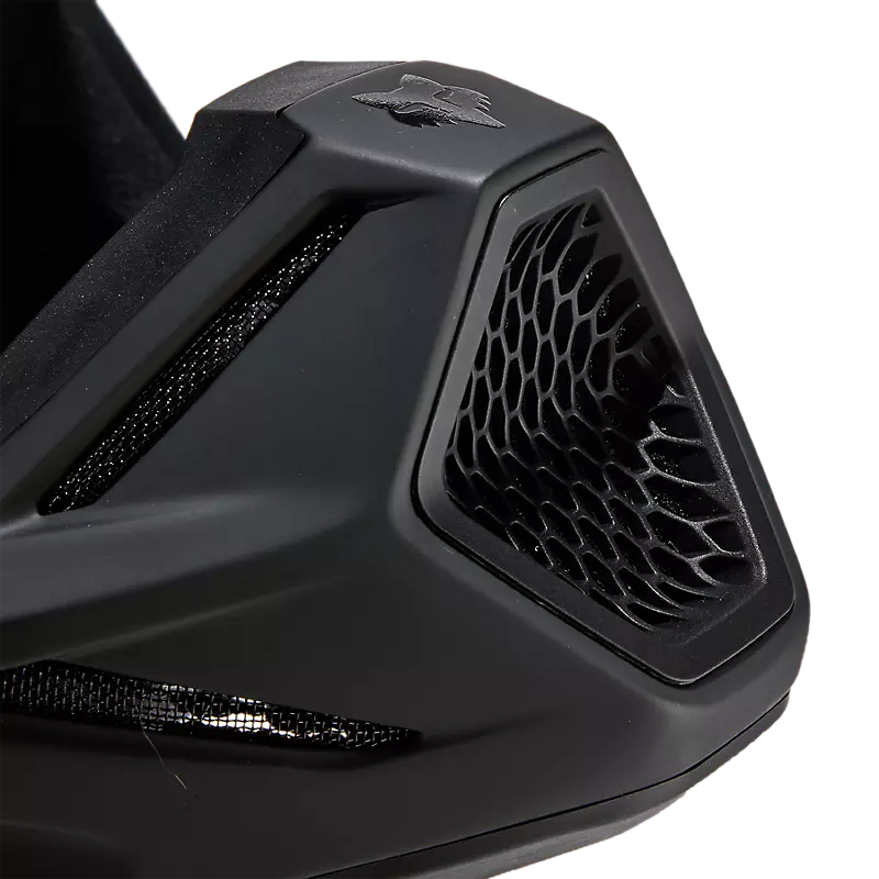 Detail shot of Fox V3 Revise Helmet ventilation ports for optimized airflow and comfort during off-road riding.