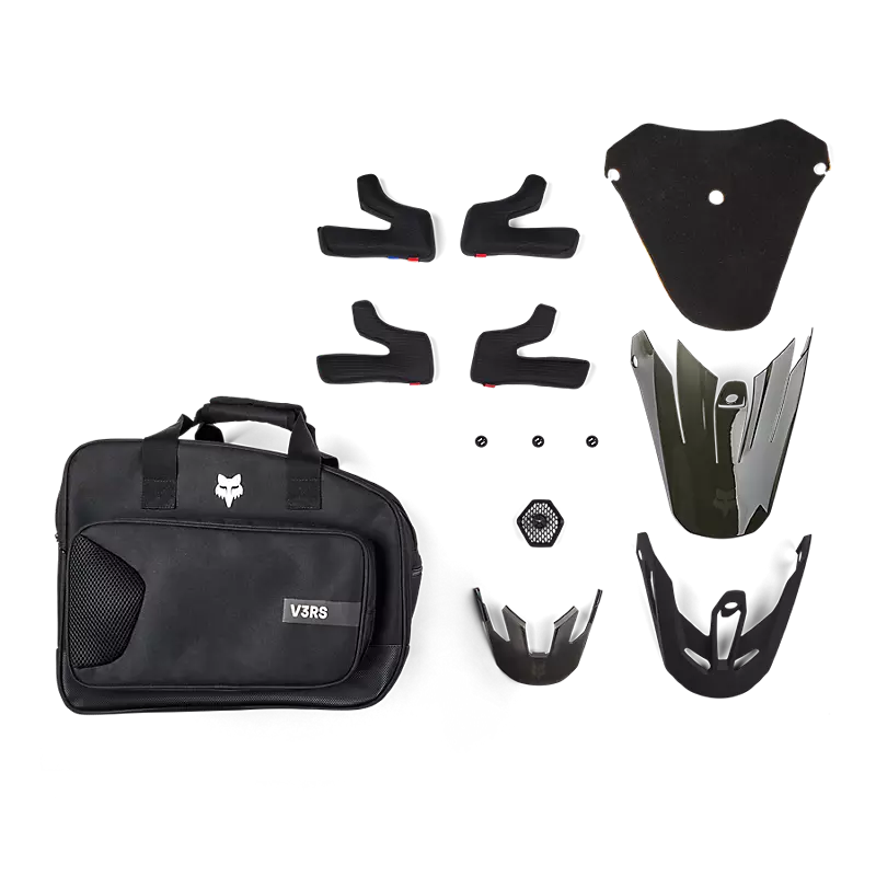 Fox V3 RS Carbon Helmet full accessory kit — visor, padding, and spare parts for professional riders.