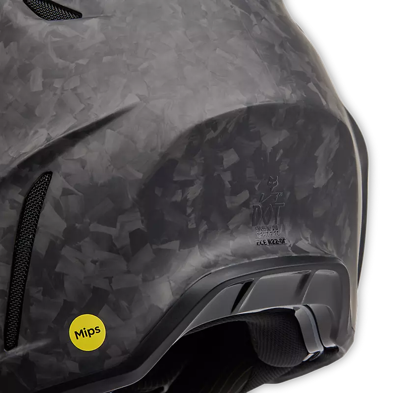 Detail of Fox V3 RS Carbon Helmet carbon weave texture — advanced composite shell engineering.