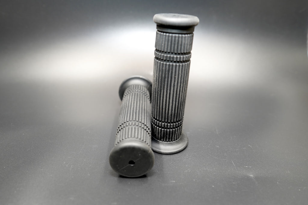 Close-up of ribbed texture showing fine groove pattern — timeless black grips for vintage builds.
