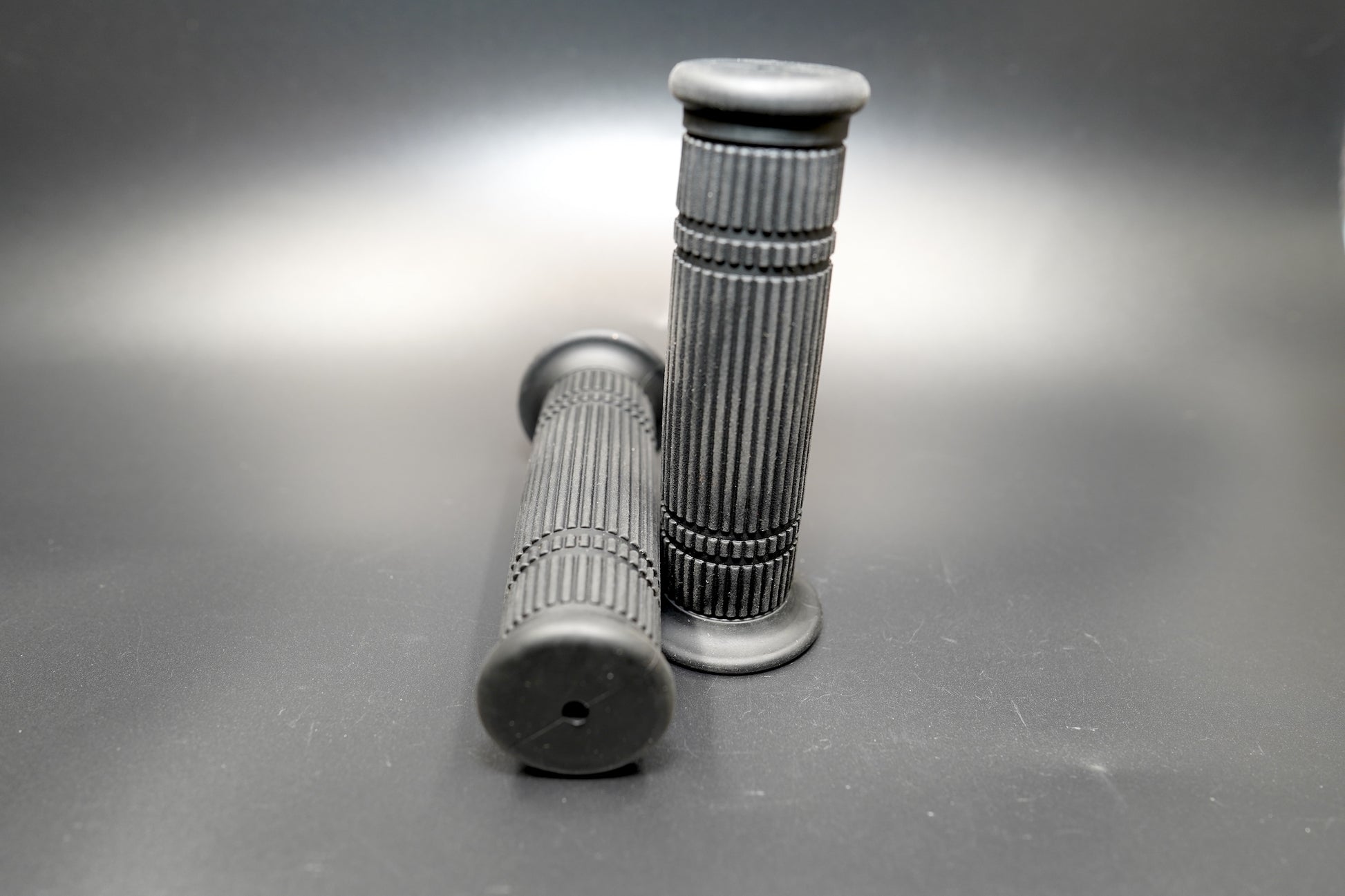 Close-up of ribbed texture showing fine groove pattern — timeless black grips for vintage builds.
