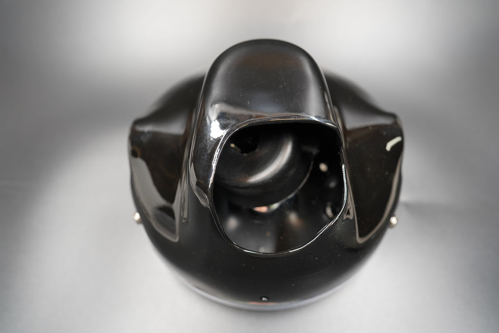 Rear perspective showing mounting bracket and wire exit