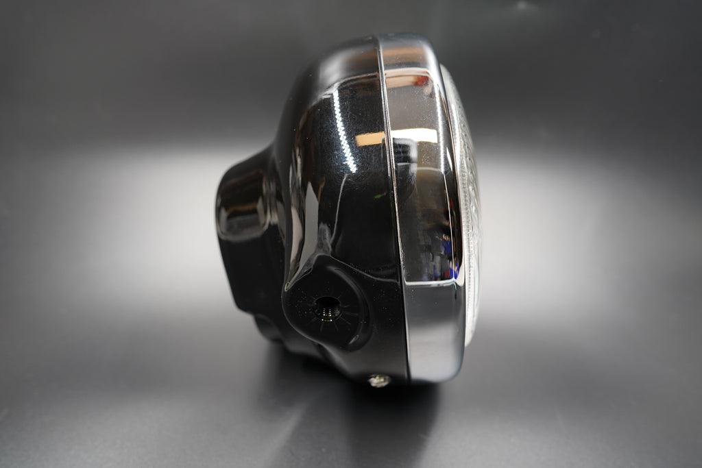 Side view highlighting compact 135mm depth and clean side-mount profile.