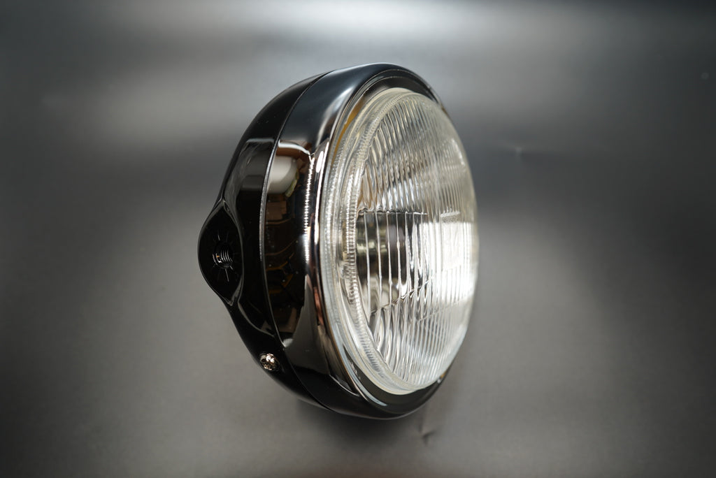 Right side angle showing smooth chrome housing curvature