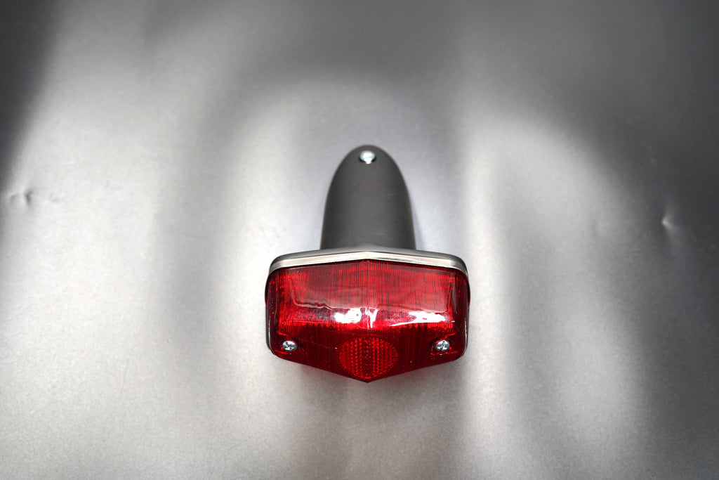 Rear view showing brake and tail function lens — CE-ready dual-light design for café racers and customs.