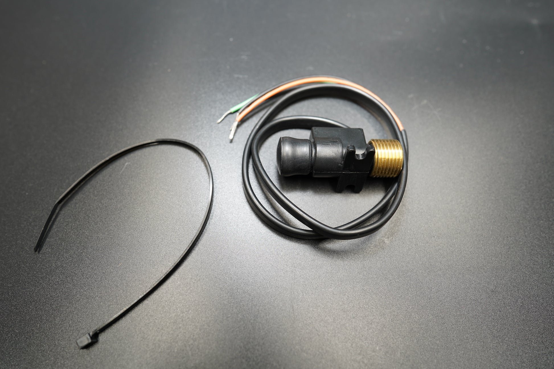 Side view of 12mm converter showing connector and cable orientation.