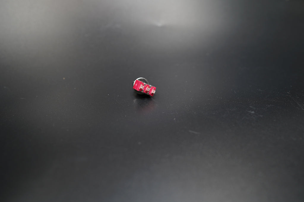 Angled shot showing toggle lever and red base clearly