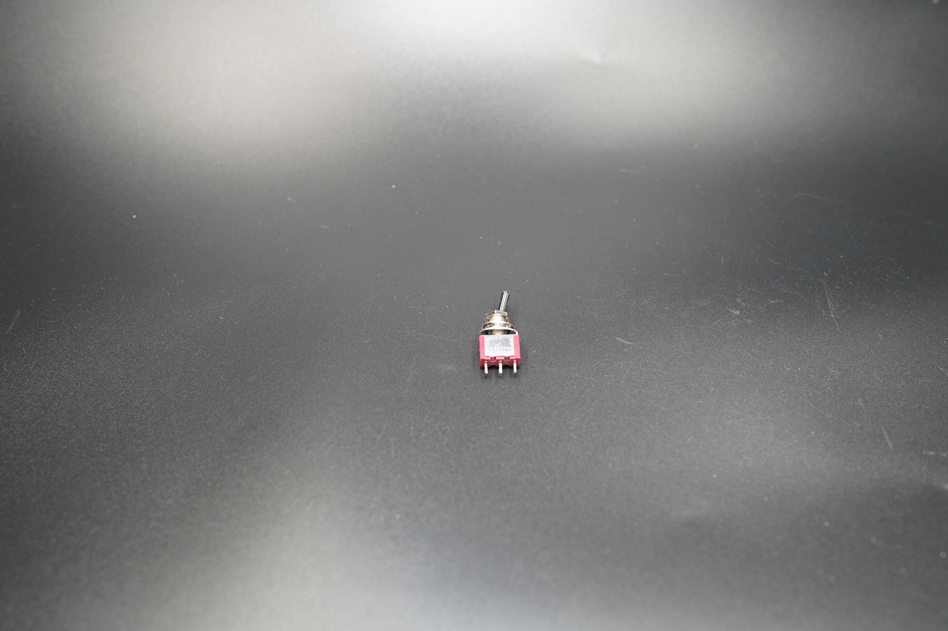 Close-up of toggle handle and metal nut