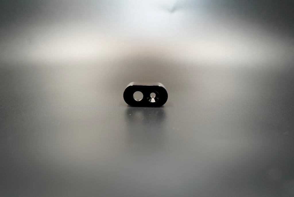  Front view of matte black single-hole handlebar switch housing