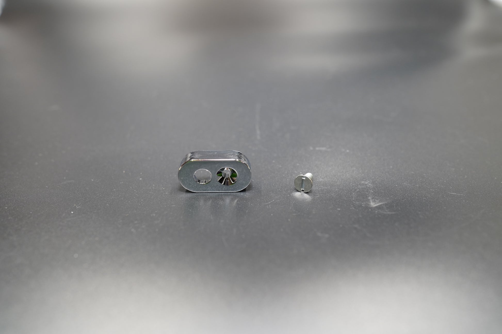 Black dual-hole version with mounting hardware displayed