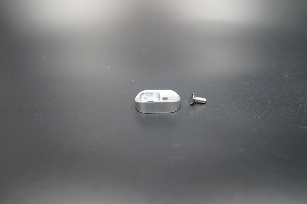 Top view of raw silver dual-hole switch housing