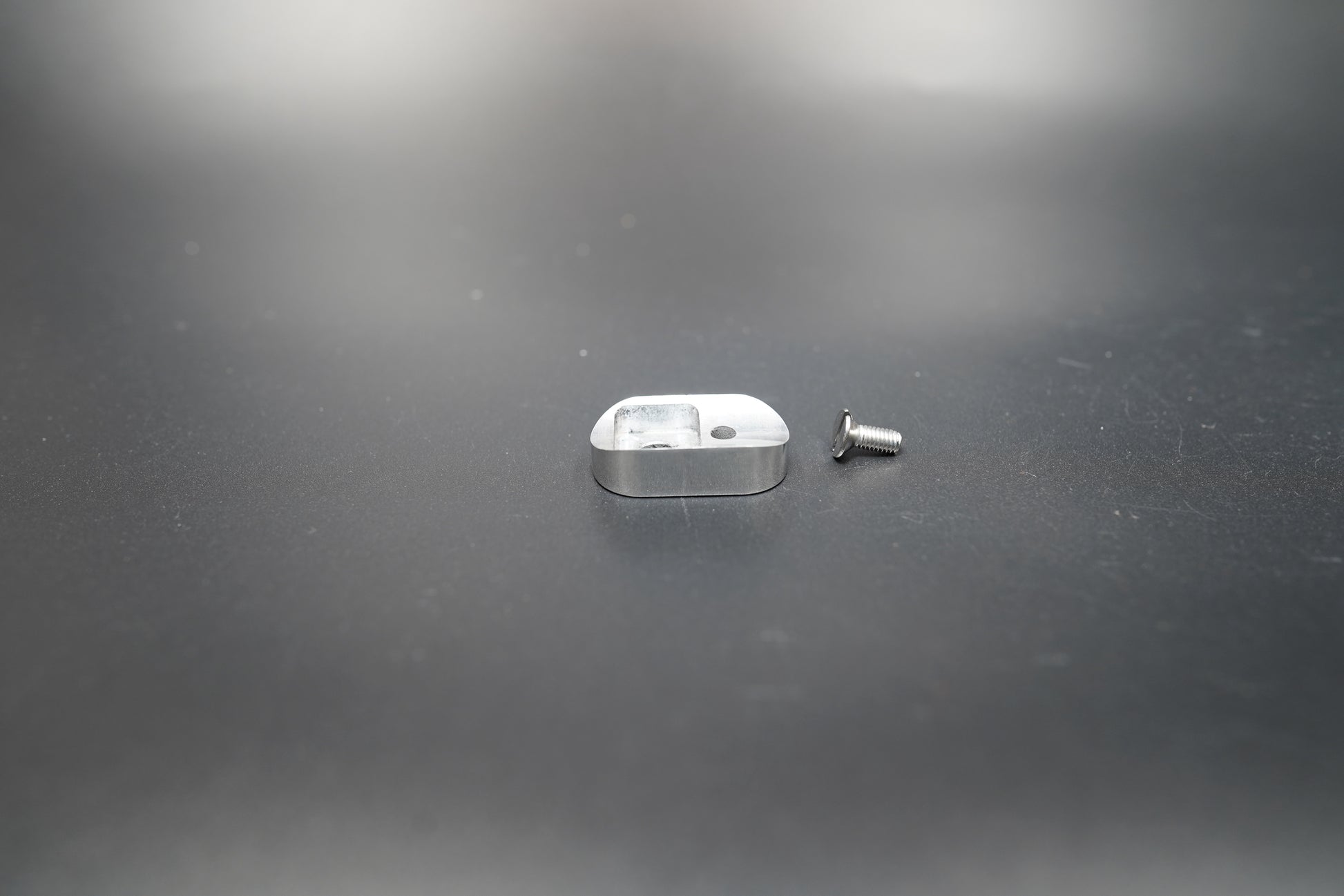 Top view of raw silver dual-hole switch housing