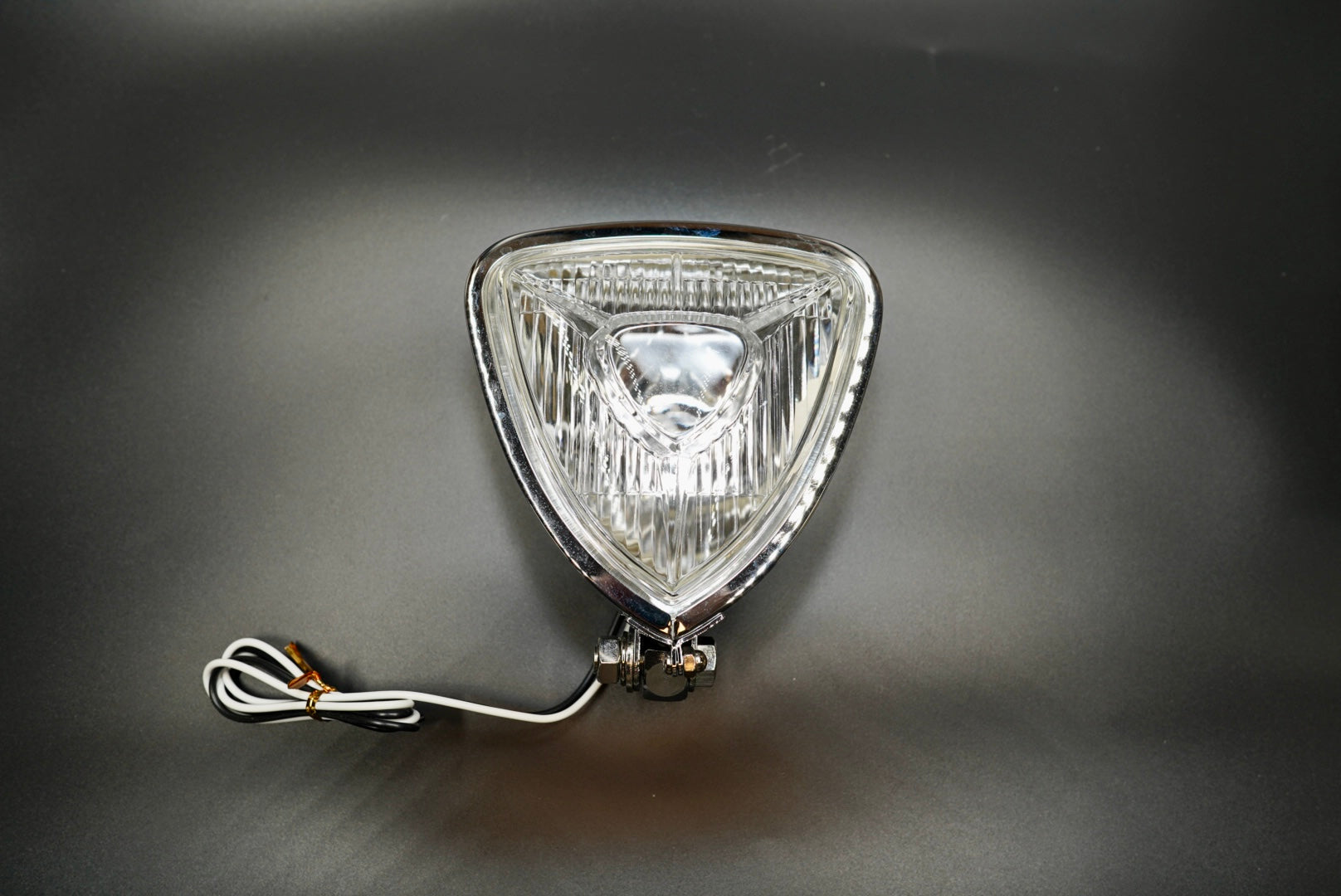 Retro Triangle Motorcycle Headlight – Clear / Amber Lens