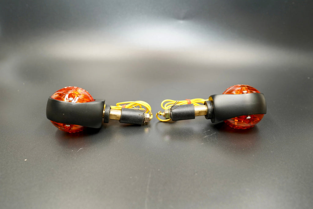 Bar End Turn Signal – front view showing amber glass lens