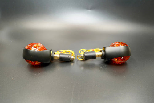 Bar End Turn Signal – front view showing amber glass lens