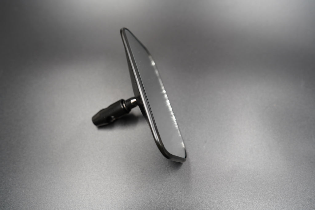 Side profile of the rectangular vintage motorcycle mirror — balanced proportions and sleek polished edge.