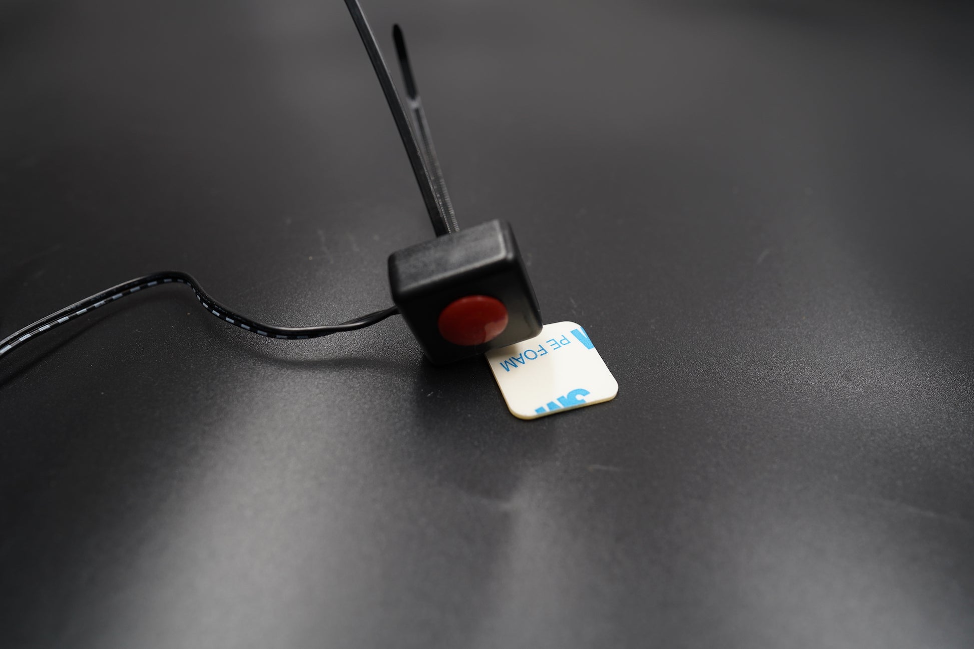 Flat lay of full kit with speedometer and wire harness on matte background.