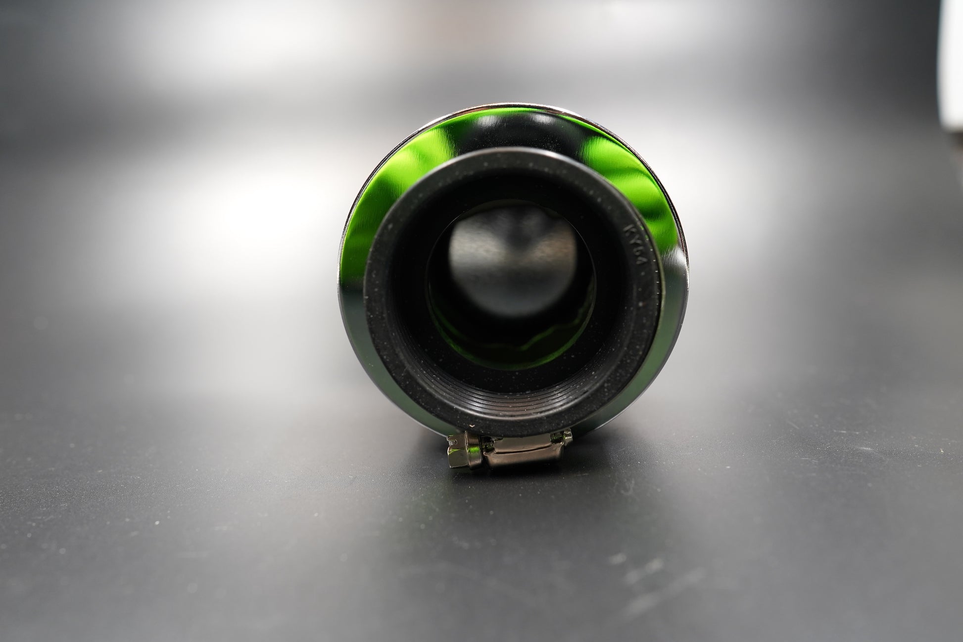 Rear inlet view of chrome air filter showing rubber neck and stainless steel clamp