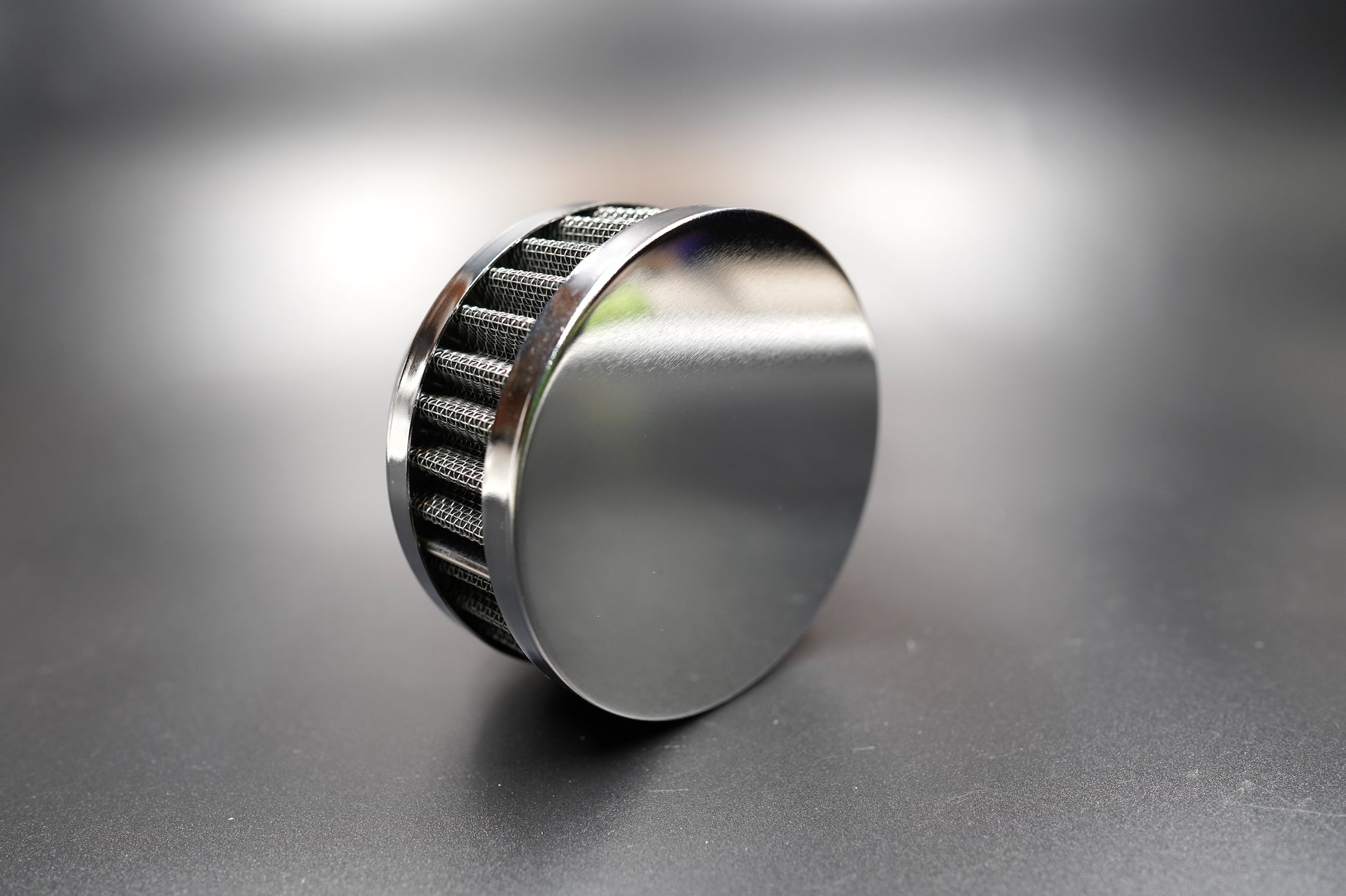 Side angle of retro chrome air filter showing compact 45mm height and polished finish 