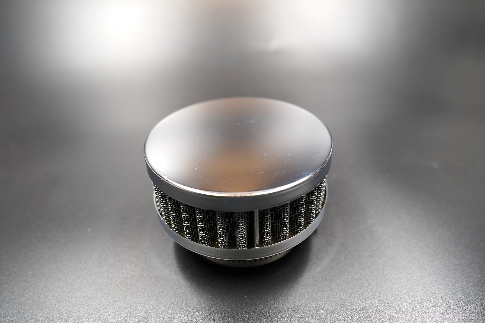 Top view of classic dome chrome air filter with fine mesh construction
