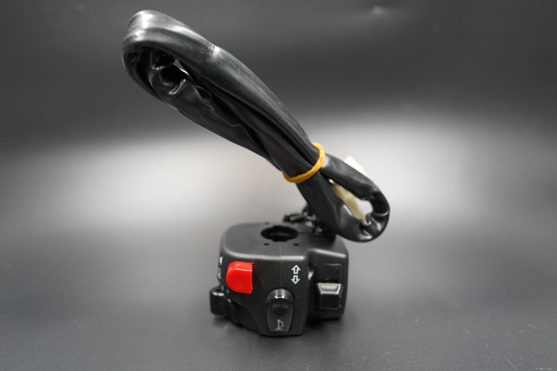 Flat lay of both switch units arranged side by side on grey surface.