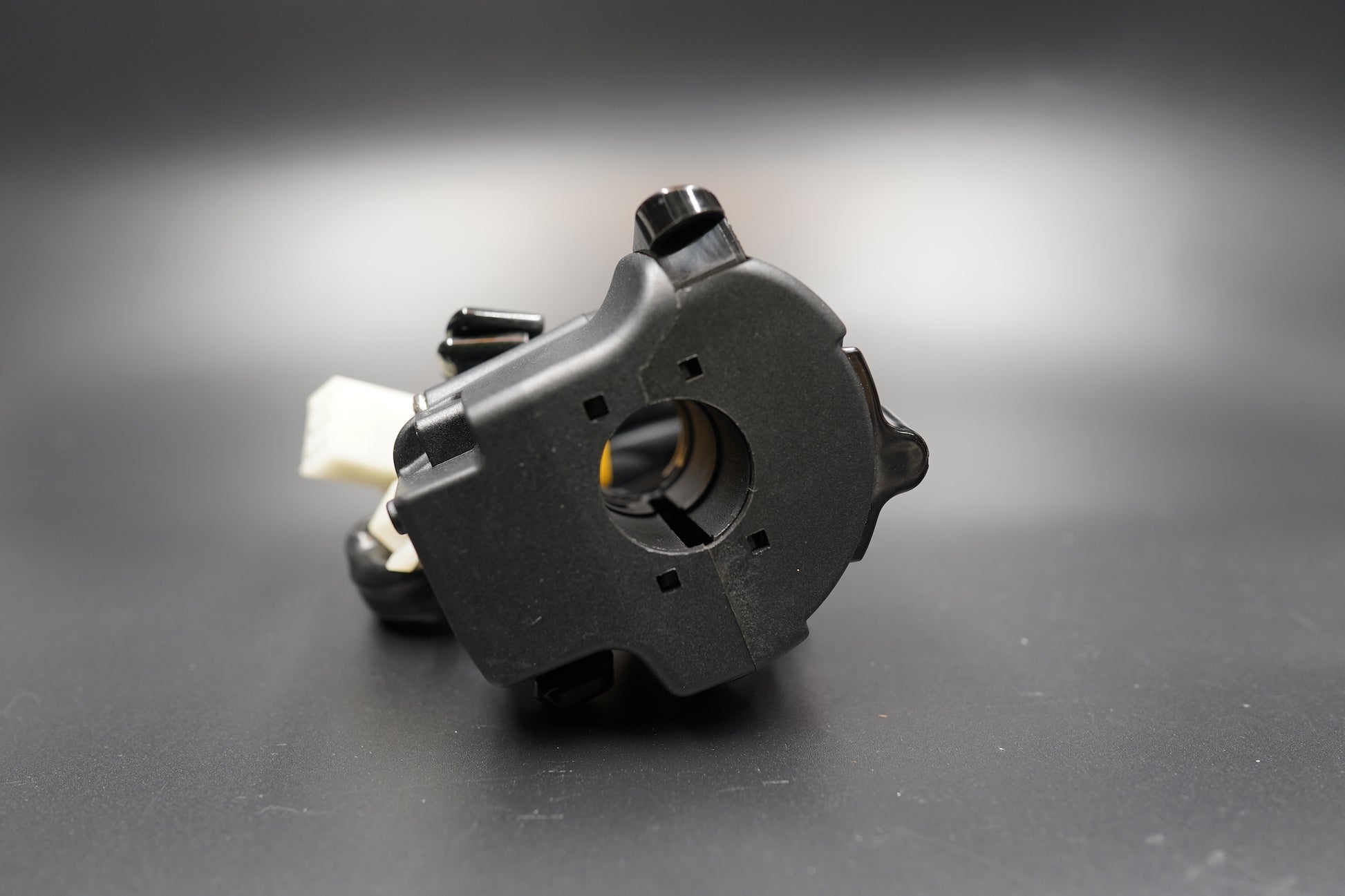 Side profile view showing wiring and toggle placement.