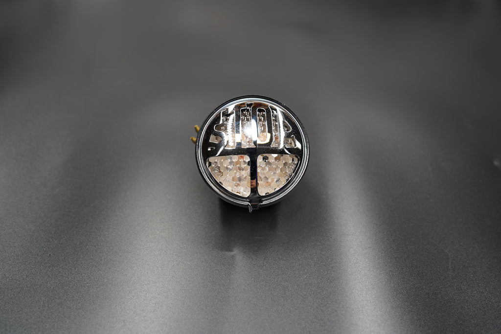 Rear view showing metal housing and wiring exit